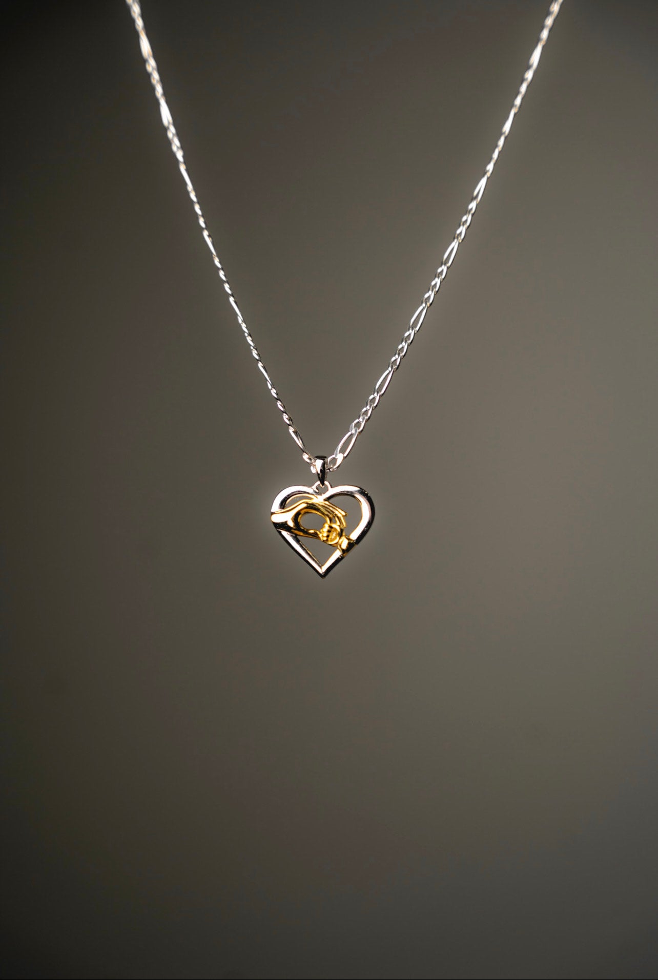 Sterling Silver/ 14k Gold Child Holding Mom Hands Heart Pendant